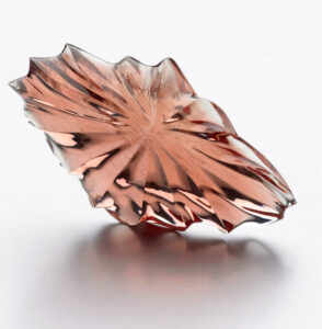 2005 Cutting Edge Award Winner: William Cox, Dust Devil Mining Co., 84.90 ct. freeform Sunstone with copper inclusions