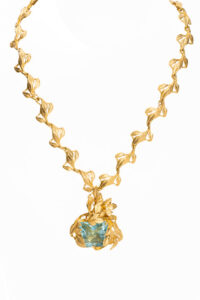 Necklace in 18K yellow gold with a 33.18 ct. trapezoid-shape Aquamarine, $32,500; Dan Telleen for Karats Vail