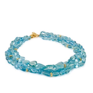 “Laura” beaded Aquamarine (808.30 ctw.) necklace with 18K yellow gold rondelles and a medium size “Mimi” toggle clasp, $60,000; Katy Briscoe