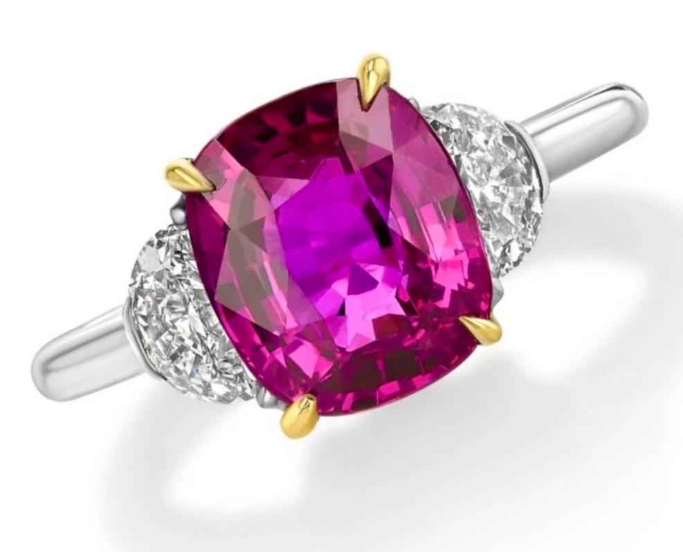 Ring in platinum and 18K yellow gold with a 4.11 ct. untreated Mozambique Ruby with half-moon cut Diamonds (0.48 ctw.) and an AGL report, AG Gems & Jewelry, Inc.